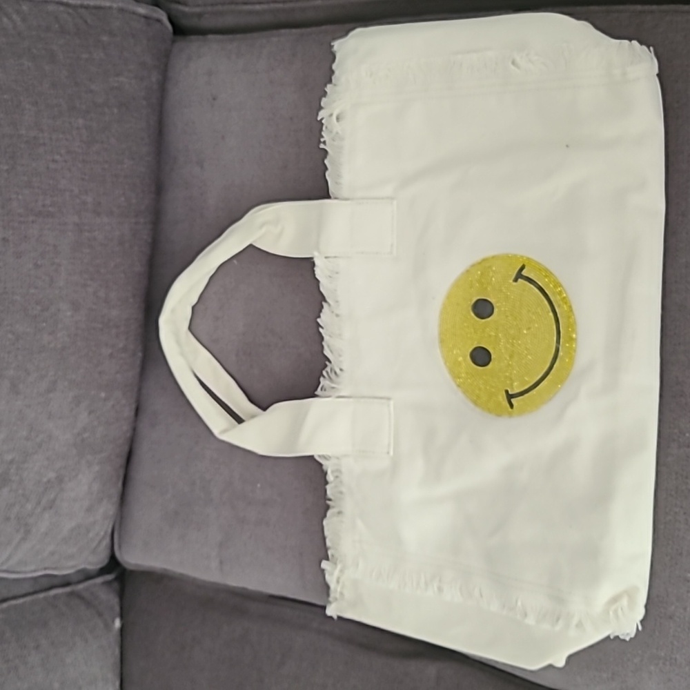 White canvas tote with rhinestone smiley face